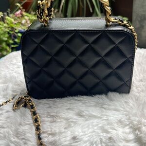 Chanel black and gold  beautiful small purse with gold accents